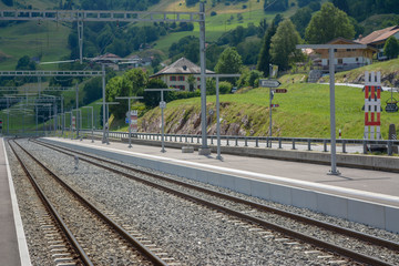 Obraz premium Railway lines cutting through alps