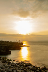 Fototapeta premium Sunrise in Isle of Portland in south of England in a long exposed photo