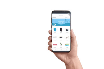Isolated smart phone in hand with online store app. Concept of flat design app with grab deals ad and product categories.