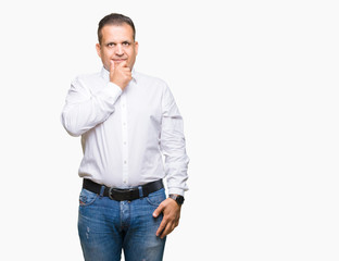 Middle age arab elegant man over isolated background looking confident at the camera with smile with crossed arms and hand raised on chin. Thinking positive.