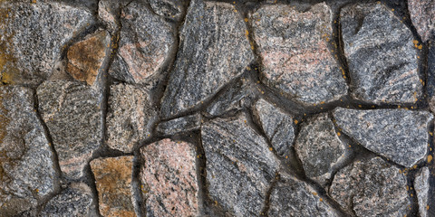 Old wall of natural stone. Abstract background