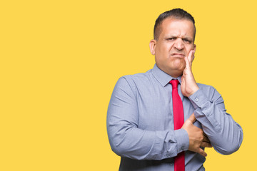 Middle age arab man wearing red tie over isolated background thinking looking tired and bored with depression problems with crossed arms.