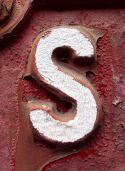 Written Wording in Distressed State Typography Found Letter S