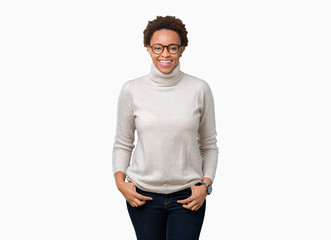 Fototapeta premium Young beautiful african american woman wearing glasses over isolated background with a happy and cool smile on face. Lucky person.