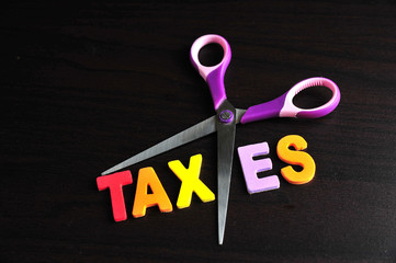 scissors and the alphabet TAXES