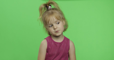 Positive blonde girl in purple dress. Pretty little blonde child. Chroma Key