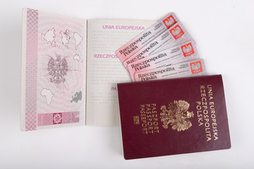Polish passport and ID card on a white table. Personal documents from a European country.