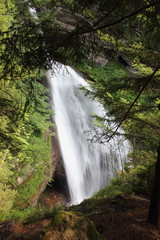 Waterfall in Dolomites mountains