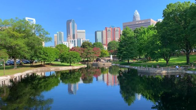 Charlotte cityscape from Marshall Park on a clear summer morning