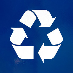 white recycle sign isolated on blue background