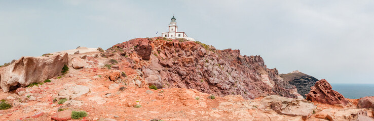 Panoramic view of the famous Akrotiri Lighthouse, located at he west end of the greek island santorini.