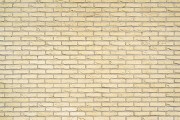 Yellow Brick wall background or texture. Old yellow brick wall texture background