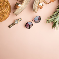 Summer background with wicker fashion bag, and women's summer shoes, pineapple and sun glasses,...