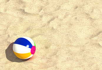 A beach ball on a beach