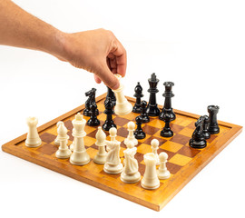 Hand Moving Chess Piece - Isolated on White Background