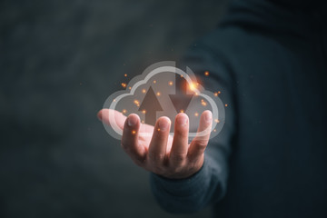 man holding icon cloud computing network and data information in hand.Cloud computing and technology concept.