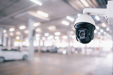 CCTV Security Camera setup on Parking lot © Looker_Studio