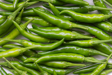 Close up of green chili peppers
