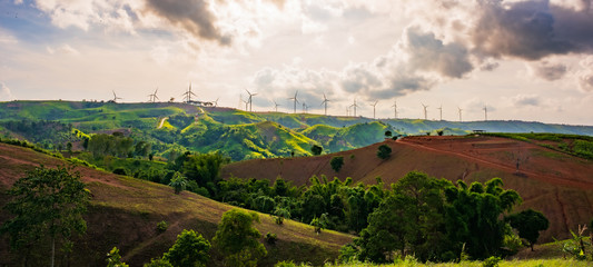 landscape image with Mountain and wind turbine panoramic view.