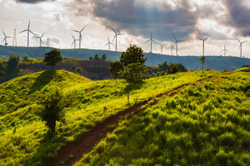 landscape image with Mountain and wind turbine panoramic view.