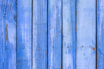 Fototapeta na wymiar Blue wooden planks with nails painted in rustic blue paint