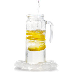 Jug of water with lemon.