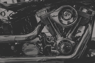 art photography in black and white vintage tone of chopper motorcycle engine., dim vintage tone