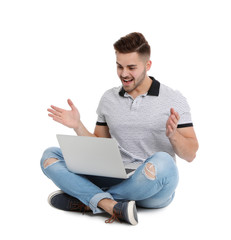 Happy man with laptop on white background