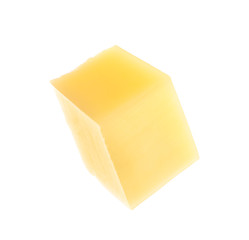 Cube of delicious cheese isolated on white