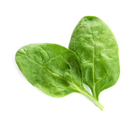 Fresh green healthy baby spinach leaves isolated on white, top view