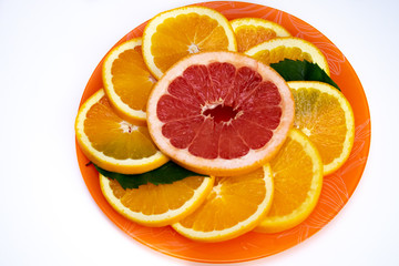 Still life of fresh oranges and grapefruits