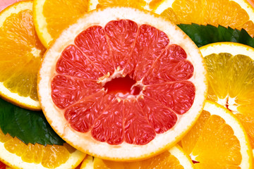Fototapeta na wymiar Still life of fresh oranges and grapefruits