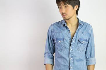 Portrait Man in Jeans Shirt or Denim Shirt Fashion Looking Below