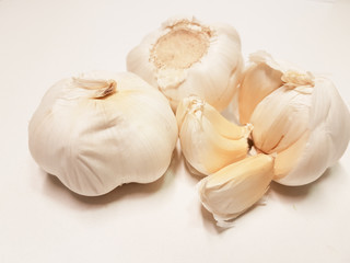 garlic isolated in white background slice and whole