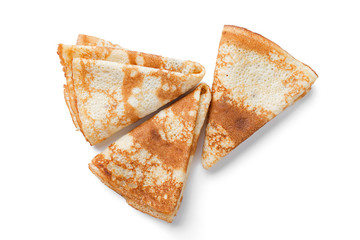 Homemade crepes (pancakes) isolated on white background.