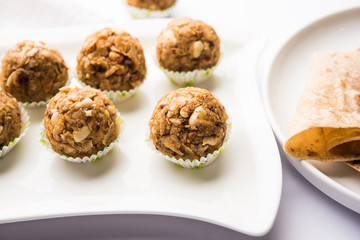 Leftover chapati Laddu / Churma Laddoo or Policha Ladu made with Roti, peanuts, dry fruits and jaggery. selective focus 
