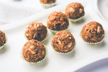 Leftover chapati Laddu / Churma Laddoo or Policha Ladu made with Roti, peanuts, dry fruits and jaggery. selective focus 