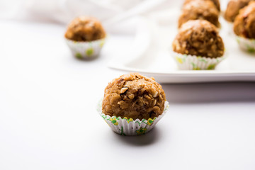 Leftover chapati Laddu / Churma Laddoo or Policha Ladu made with Roti, peanuts, dry fruits and jaggery. selective focus 