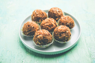 Leftover chapati Laddu / Churma Laddoo or Policha Ladu made with Roti, peanuts, dry fruits and jaggery. selective focus 