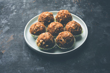 Leftover chapati Laddu / Churma Laddoo or Policha Ladu made with Roti, peanuts, dry fruits and jaggery. selective focus 