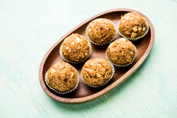 Leftover chapati Laddu / Churma Laddoo or Policha Ladu made with Roti, peanuts, dry fruits and jaggery. selective focus 