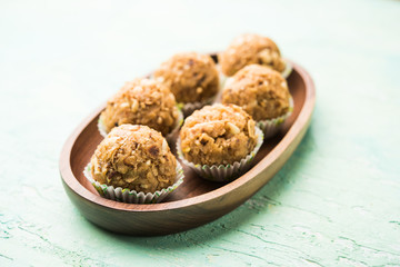 Leftover chapati Laddu / Churma Laddoo or Policha Ladu made with Roti, peanuts, dry fruits and jaggery. selective focus 