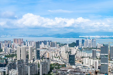 Fototapeta premium Shenzhen Nanshan District, Shenzhen, China residential real estate and Shenzhen Bay Bridge