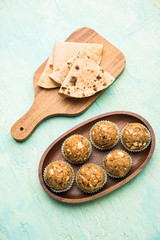 Leftover chapati Laddu / Churma Laddoo or Policha Ladu made with Roti, peanuts, dry fruits and jaggery. selective focus 