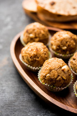 Leftover chapati Laddu / Churma Laddoo or Policha Ladu made with Roti, peanuts, dry fruits and jaggery. selective focus 