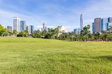 Fototapeta premium Lianhuashan Park in Shenzhen, Guangdong Province and the Civic Center in the distance