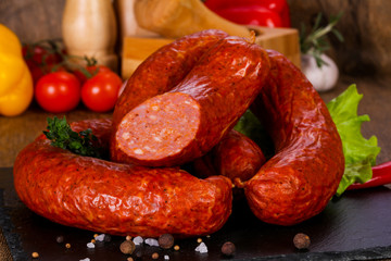 Pork sausages over wooden