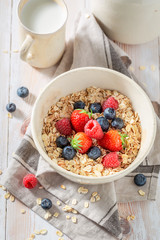 Tasty oat flakes with fresh fruits as healthy meal