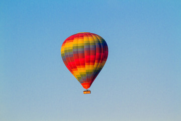 Hot air balloon flying over spectacular Cappadocia