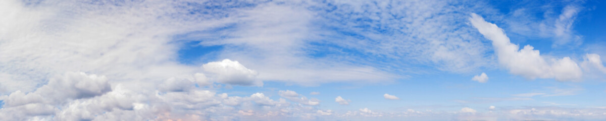 Vibrant color panoramic sky with cloud on a sunny day. Beautiful cirrus cloud. Panorama high resolution photograph.